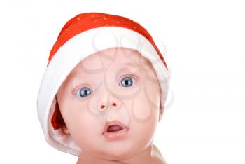 Royalty Free Photo of a Baby Boy Wearing a Santa Hat