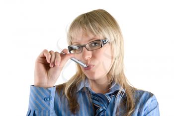 Royalty Free Photo of a Woman With a Pen in Her Mouth