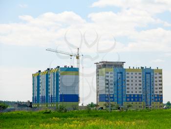 Royalty Free Photo of a Crane and Building Under Construction
