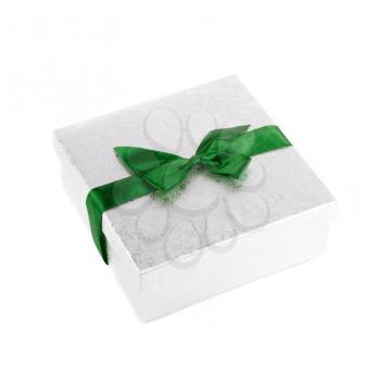 Green gift box close up isolated on white background