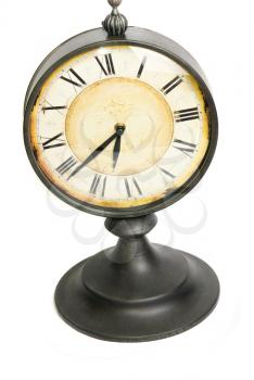 An old vintage clock isolated on a white background