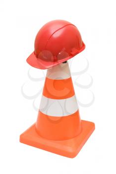 Royalty Free Photo of a Red Helmet on a Warning Cone