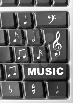 Royalty Free Photo of a Keyboard With Music Notes
