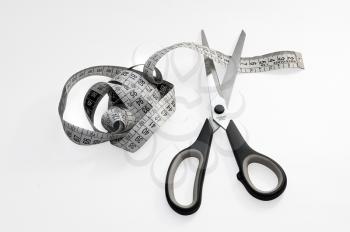 Royalty Free Photo of Measuring Tape and Scissors