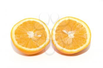 Royalty Free Photo of Two Pieces of Orange Fruit
