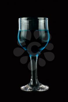 Royalty Free Photo of a Glass Full of Blue Liquid