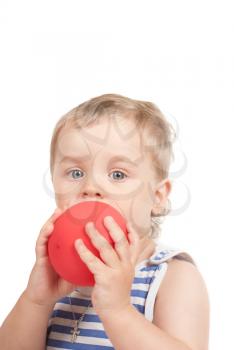 Small baby boy with a ball isolated on white