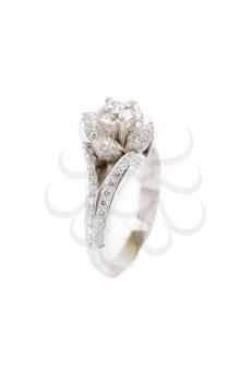 gold ring with gem on a white