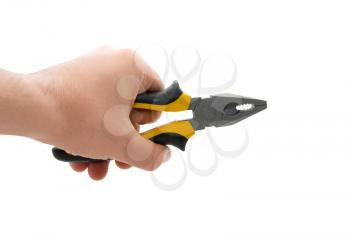 Male hand with black and yellow pliers isolated over white background 