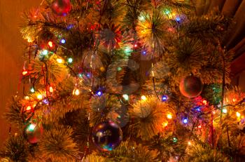 Beautiful Christmas fur-tree decorated with New Year's toys