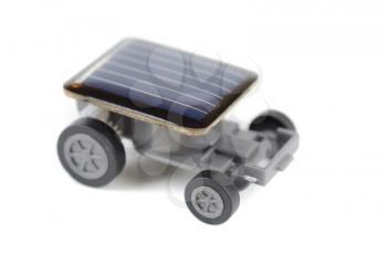 Solar powered toy car on a white background. for concept.