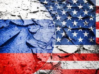 Usa sanction concept, USA flag against Russia flag, on dry cracked earth background
