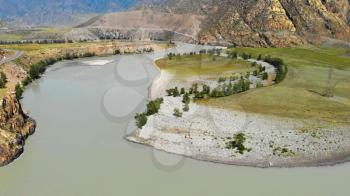 Katun river in Altai mountains. Altai Republic, Siberia, Russia. Aerial drone video, beauty sunny day.