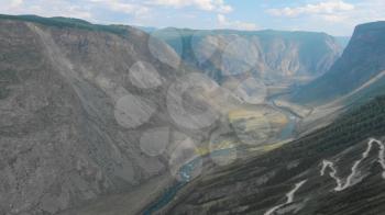 Aerial 4k video of Katu Yaryk mountain pass and the valley of the river of Chulyshman. Altai Republic, Russia, beautiful summer day