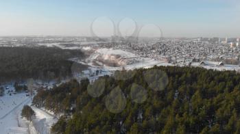 Aerial view of winter ski base in siberian forest