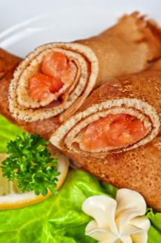 Pancakes with salted red salmon fish