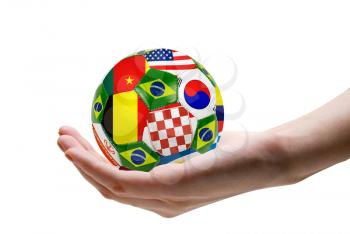 football soccer ball with nations teams flags at hand
