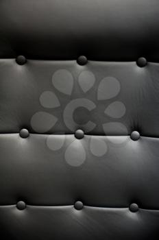 Background of black a leather armchair