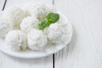 Homemade coconut candies with filling of cream and nut