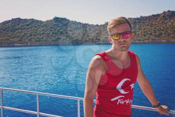 Portrait of man on yacht at the sea, Turkey 