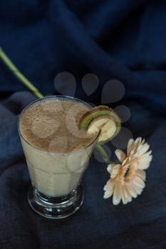 Healthy smoothie made from kiwi, bananas and orange juice