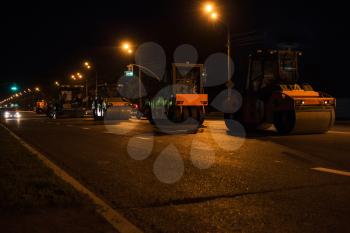 repairing the road in the night city