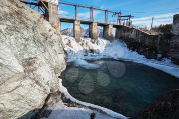 Old Hydro power station in Chemal, Altai,Siberia, Russia. Winter sunny day. A popular tourist place