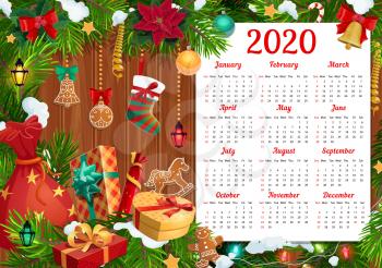 Christmas and New Year calendar vector template with Xmas gifts and bell. Year calendar in frame of pine tree with present boxes, Santa bag and balls, stocking, ribbons and snow on wooden background