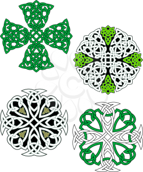 Knotted celtic ornate crosses with traditional ethnic ornament in green and white colors for tattoo or medieval art design