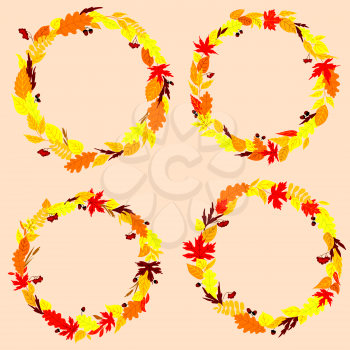 Autumn leaves wreaths or frames decorated by forest acorns, leaves, viburnum fruit bunches and dry herb sprigs on background