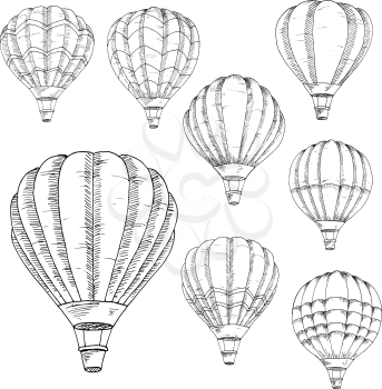 Sketched flying hot air balloons in vintage engraving style with lush envelopes. Air transportation, hobby, romantic weekend, travel design usage