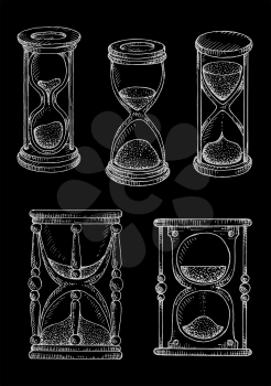 Vintage hourglasses chalk sketches on blackboard. Stylized engraving drawings of wooden sandglasses with carved decorations. May be used as time concept or symbol of passing time 