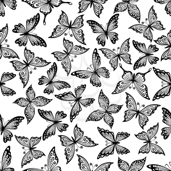 Black and white vintage seamless flying butterflies pattern with decorative wings, adorned by delicate curly ornaments. Great for nature background, elegant fabric print or interior design 