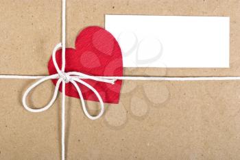 Royalty Free Photo of a Paper Package With Valentine Card