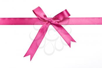Royalty Free Photo of a Pinks Ribbons and Bow