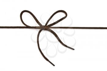 Royalty Free Photo of a Black Shoelace With Bow