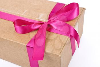 Royalty Free Photo of a Cardboard Box With a Bow