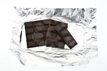 Royalty Free Photo of a  Chocolate Bar Wrapped in Foil