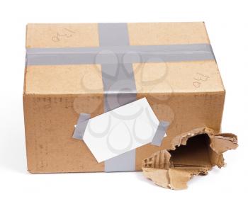 Royalty Free Photo of a Shipping Torn Box With Tag