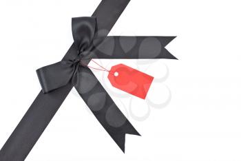 Royalty Free Photo of a Black Bow With Label