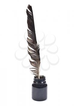 Royalty Free Photo of an Ink Bottle With a Feather