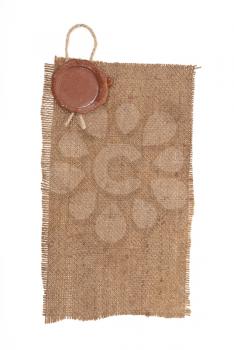 Wax seal on sackcloth material 