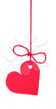 Royalty Free Photo of a Red Heart Tag With a String