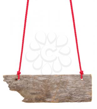 Royalty Free Photo of a Handmade Sign Made out of a Piece of Wood With Two Red Ropes for Hanging