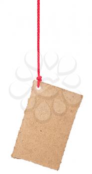 Royalty Free Photo of a Cardboard label on a Red String