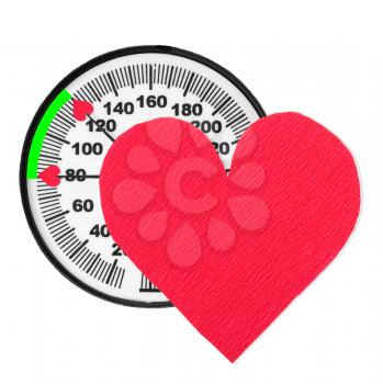Royalty Free Photo of a Blood Pressure Monitor and a Heart Icon on a White Background