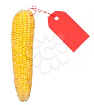 Ripe ear of corn with a red price tag