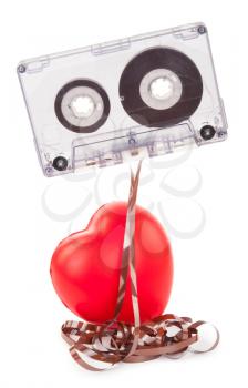 audio tape cassette and a red heart