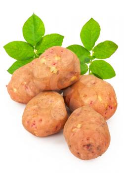 Red potatoes with leaves on a white