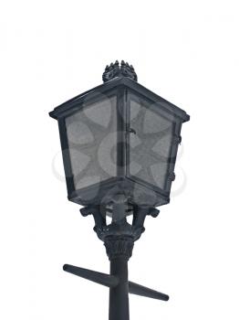 Old lantern in the street on the white background